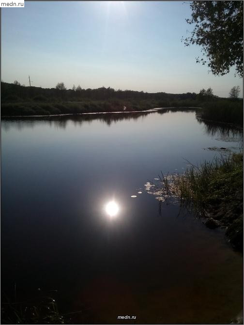 Отражение солнца в реке